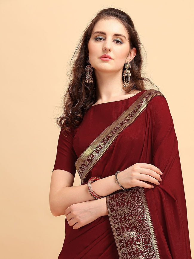 https://www.inddus.in/cdn/shop/products/maroon-solid-saree-with-brocade-border-165323_650x.jpg?v=1630051462