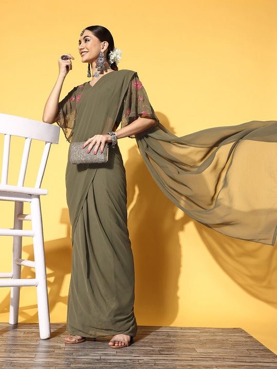 Stunning actress Bhanu Sri wearing mehndi green layered ney skirt and  embroidery black lace blouse.